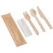 A TreeVive by EcoChoice compostable wooden cutlery set in plastic packaging with a white napkin.