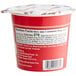 A red container of Bob's Red Mill Apple Cinnamon Gluten-Free Oatmeal with a white label and black text.