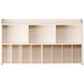 A natural maple wood wall-mount diaper organizer with 11 compartments.