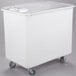 A white Cambro ingredient storage bin with a sliding lid on wheels.