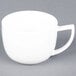 A C.A.C. Collection bright white porcelain coffee cup with a handle.