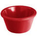 An Acopa red smooth melamine ramekin on a white background.