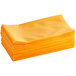 A stack of orange Lavex dusting cloths.