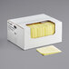 A white box with yellow ChoiceHD foodservice wipers inside.
