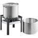 A Backyard Pro seafood boiler and steamer kit with a large pot and metal basket on a stand.
