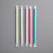 A group of four Choice jumbo neon plastic straws in plastic bags.