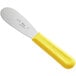 A Choice stainless steel sandwich spreader with a yellow polypropylene handle.