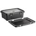 A black CaterGator food pan carrier with a silver stainless steel lid on a counter.