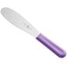 A Choice stainless steel sandwich spreader with a purple handle.