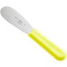 A yellow sandwich spreader with a yellow handle.