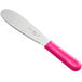A stainless steel sandwich spreader with a neon pink handle.