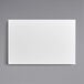 A white rectangular Melamine-coated wood cake board with a gray border.