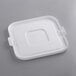 A white plastic lid for a square container.