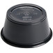 A Dart black plastic souffle cup with a round black lid.