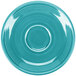 A turquoise Fiesta saucer with a white rim and circle in the middle.