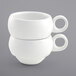 Two stackable Front of the House Monaco bright white porcelain cups with handles.