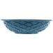 A blue round weave basket with a pattern.