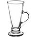 An Acopa Select clear glass coffee mug with a handle.