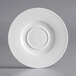 A white Acopa Liana porcelain saucer with a circular pattern.