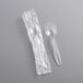 A Visions heavy weight clear plastic soup spoon individually wrapped in clear plastic.