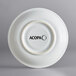 An Acopa Capri coconut white china saucer with black text reading "Sample" in the center.
