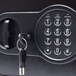 A Barska black steel security safe with a digital and key lock and keypad.