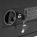 A Barska compact black steel depository security safe with key and digital keypad inside.