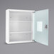 A white Barska medicine cabinet with a tempered glass door and silver hinges.