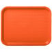 An orange plastic tray with a grid pattern.