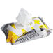 A white and yellow package of WipesPlus table wipes.