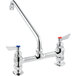 A silver Waterloo deck-mounted faucet with red and blue knobs.