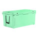 A seafoam green cooler with black handles.