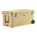 A tan CaterGator outdoor cooler with black wheels and a black handle.