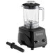 A Galaxy commercial blender with a black lid and handle on a clear plastic jar.
