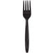 A black plastic fork with a white handle.