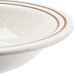 A white melamine salad bowl with brown stripes.