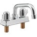 A silver Regency deck-mount faucet with chrome handles.