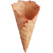 A close-up of a waffle cone with a red design.