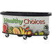 A Cambro vending cart with a "Healthy Choices" sign and fruits and vegetables on it.