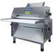 A Somerset countertop dough sheeter with a stainless steel top.