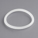 A white plastic seal ring with a white circle.