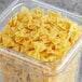 A plastic container of Barilla Farfalle (Bowtie) pasta.