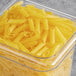 A case of Barilla Gluten-Free Penne Pasta on a table.