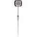 A black and white AvaTemp digital thermometer with a long metal stick.