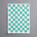 A white and green checkered paper.