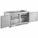 An Avantco stainless steel refrigerated salad bar with two doors open on a stainless steel counter.
