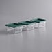 Three Vigor clear square plastic containers with green lids.