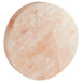 An 8" round pink Himalayan salt slab.