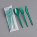 A green EcoChoice plastic spoon, fork, and knife.