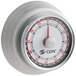 A silver CDN mechanical kitchen timer with a red and white dial.